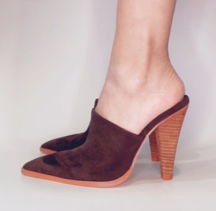 video of woman wearing high heeled brown suede leather vegan mule shoes